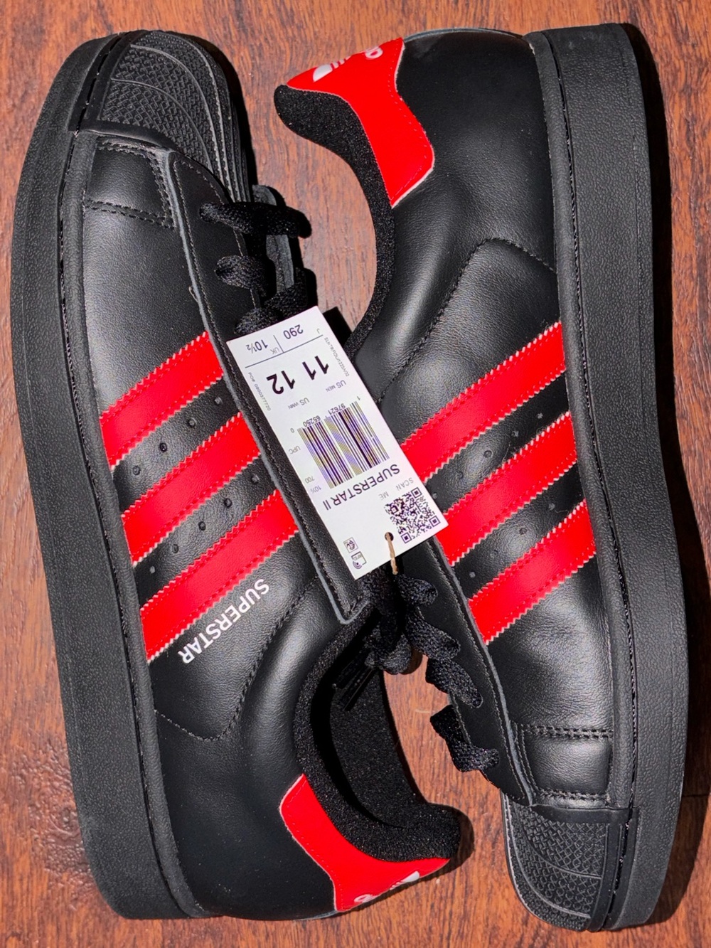 Adidas size 11 Black & Red Low-Top Sneakers